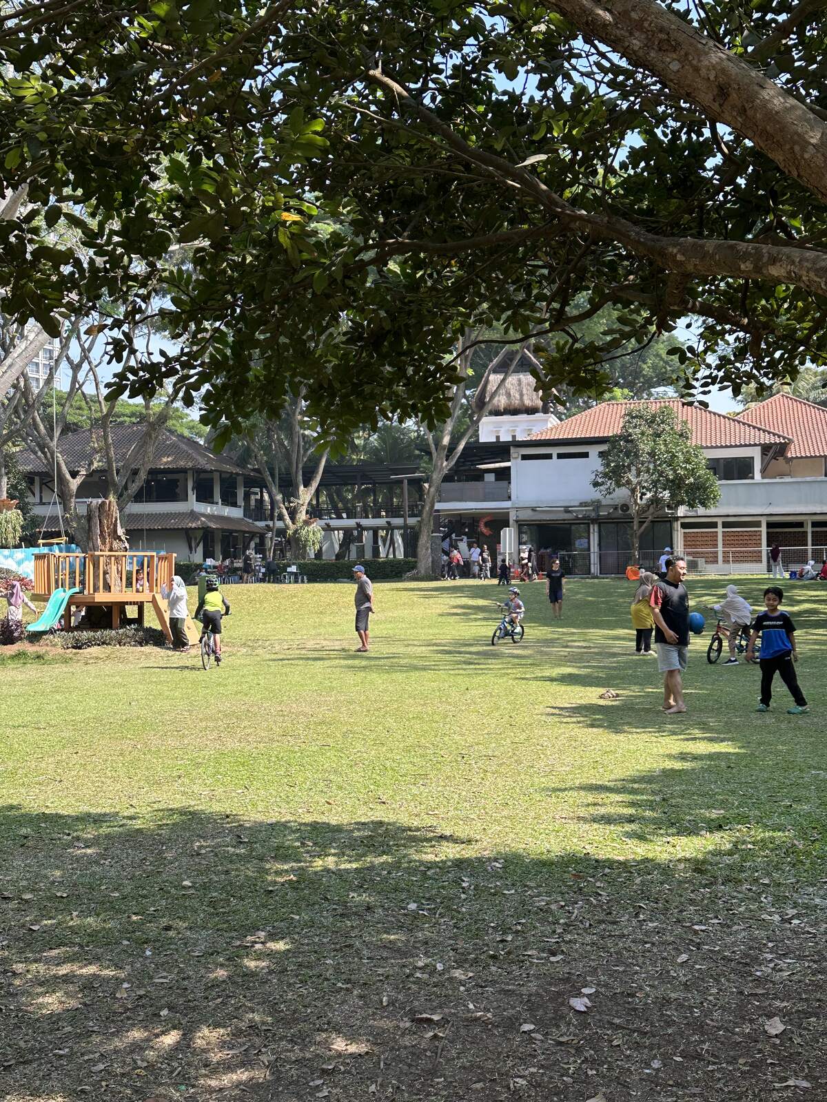 Children playing and cycling at the bike park in Kota Baru Parahyangan